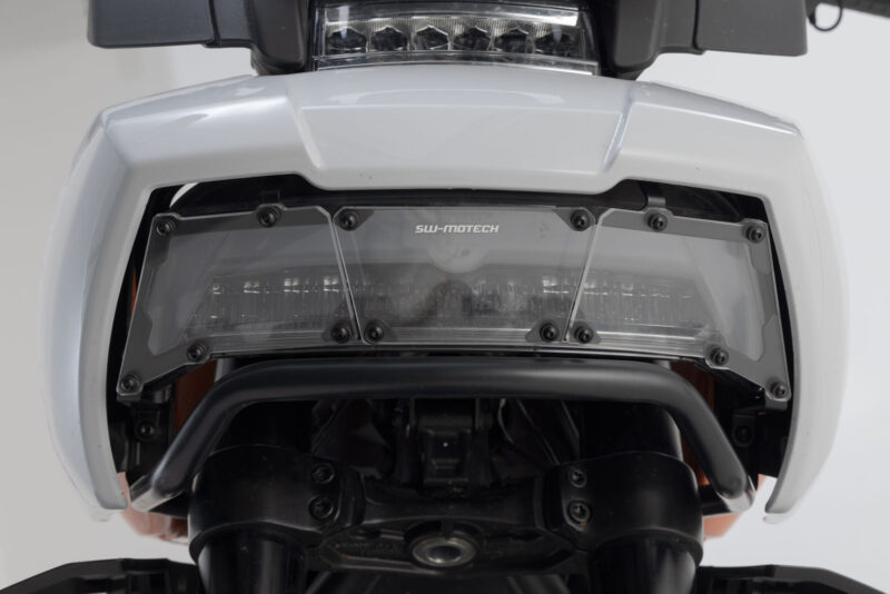 Protection de phare Support avec écran PVC. H-D Pan America (21-).