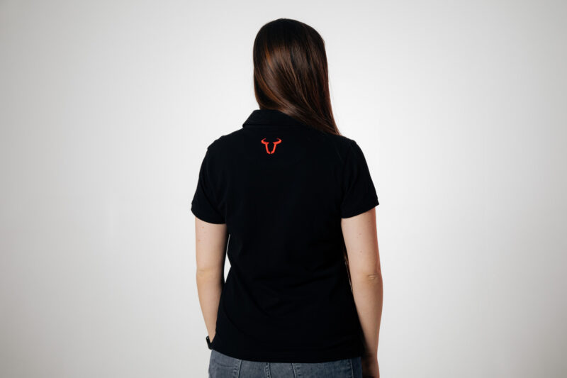 Polo team Core Line. Noir. Dames. Taille S.