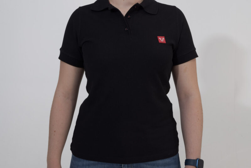 Polo Core Line. Noir. Dames. Taille XS.