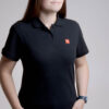 Polo Core Line. Noir. Dames. Taille L.